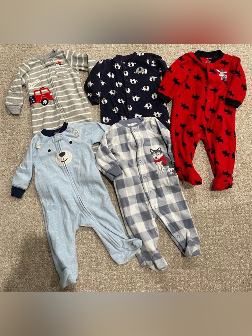 Bundle of 7 fleece footie pajamas
